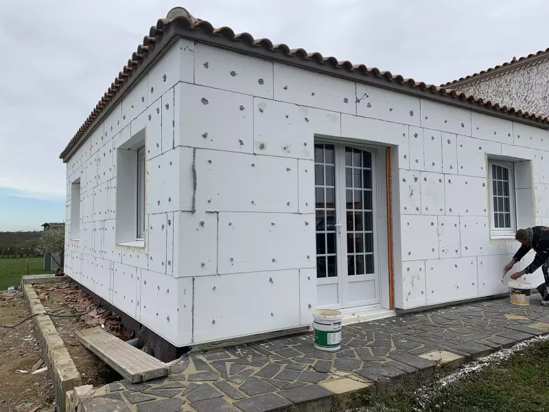 Soufflage de ouate de cellulose dans combles à Crest