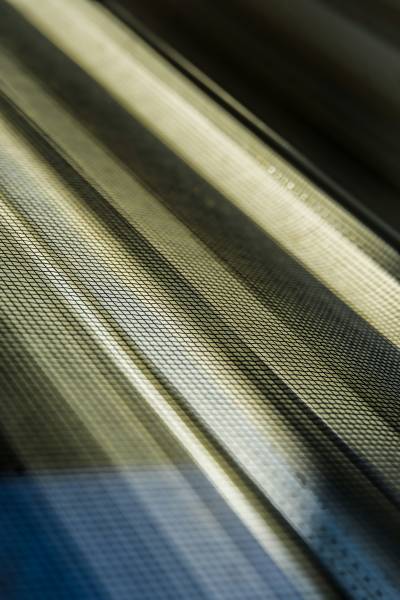 Moustiquaire sur mesure installée sur une baie vitrée coulissante à Carpentras, alliance de design et de protection contre les insectes